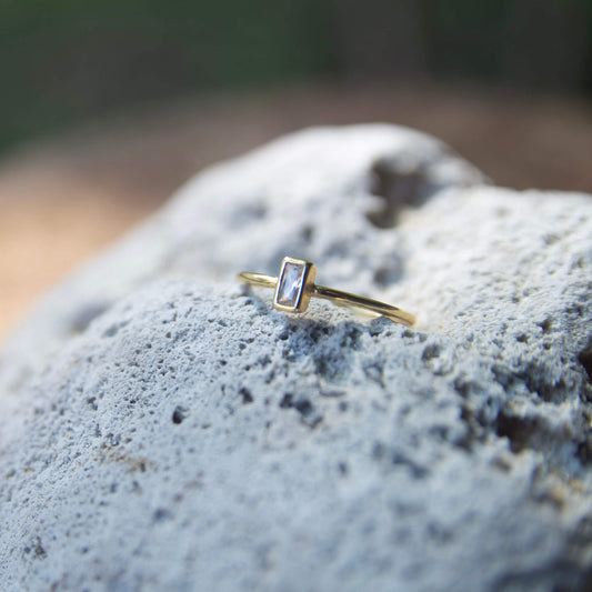 Gold Plated Stone Ring on a rock