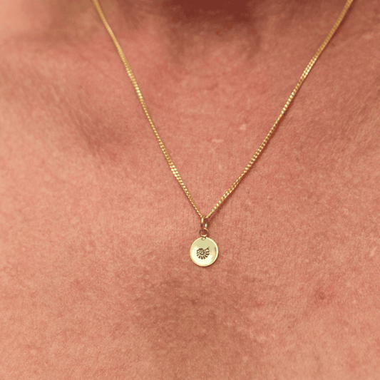 Gold Plated Shell Necklace worn by woman