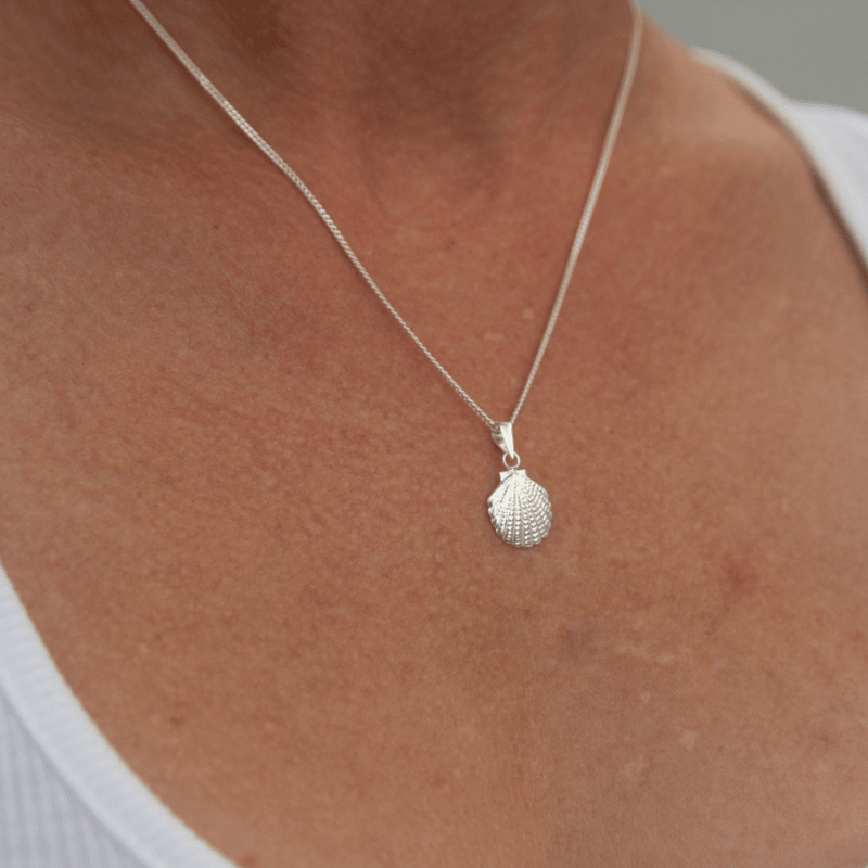 Sterling Silver Shell Necklace worn by a woman