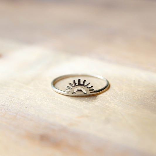 Sterling Silver Sunrise Ring on table