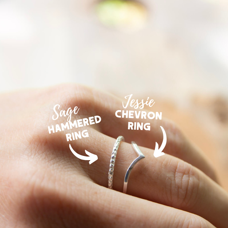 silver rings on a finger