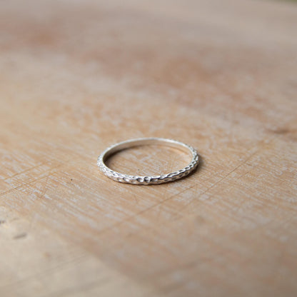 Sterling Silver Hammered Ring on a table