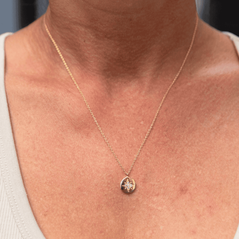 Gold Plated Pendant Necklace worn by a woman