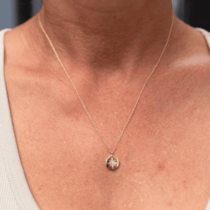 Gold Plated Pendant Necklace worn by a woman