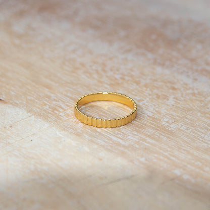Gold Plated Patterned Ring on a table