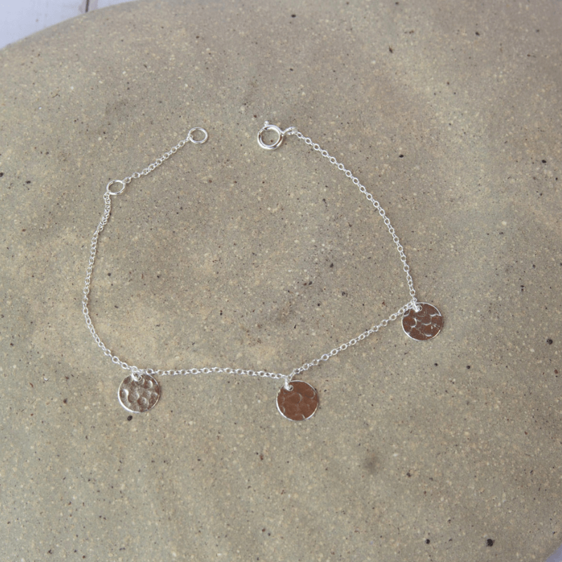 silver bracelet with hammered discs 